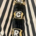 anelli lettera oro onice e diamanti